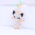 Sparkly crystal rhinestone cat keychain with golden alloy finish and dangling tail - As Shown / Individual OPP Bag Packaging