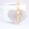 Portachiavi a cuore dorato con cristalli scintillanti e design unico per borse - Imballaggio Individuale / Bianco