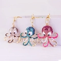 Cute octopus rhinestone keychains in silver, blue, and pink with gold metal finish - Random Color