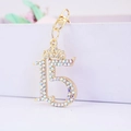 Portachiavi dorato numero 15 con corona e strass colorati brillanti per donne - Bianco AB