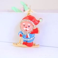 Portachiavi Babbo Natale su monopattino con smalto colorato e dettagli in cristallo - Pezzo Singolo / Rosso Blu Oro