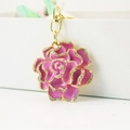Pink enamel rose keychain with sparkling rhinestones and gold-plated metal hook - Purple