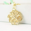 Chic multi-layered rose keychain in cream enamel with sparkling rhinestones and gold ring - White