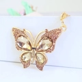 Llavero de mariposa brillante con gemas de color champán y cierre dorado - Dorado