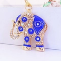 Golden elephant keychain with blue enamel evil eye and sparkling crystals for bags - Blue (YS1481)