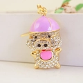 Porte-clés cochon rose étincelant avec casquette et finition en plaqué or - Pièce Unique / Violet