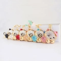 Sparkling rhinestone sleeping cat keychains with floral decor in multiple colors - Random Color
