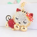 Cute kitten keychain with white and red rhinestones on a gold-plated flower cat pendant - Red
