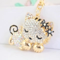 Sparkling rhinestone kitten keychain in gold alloy with colorful crystals for bags - AB White