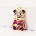 Glinsterende paarse strass panda sleutelhanger met roze sjaal op gouden metalen ring - Paars