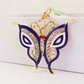 Royal blue butterfly keychain with gold plating and sparkling crystal accents - Blue