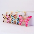Colorful rhinestone butterfly keychains in gold alloy with four vibrant color options - Random Color