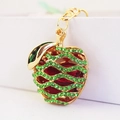 Portachiavi mela dorata con design traforato ed eleganti strass di cristallo verde brillante - Verde