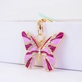 Goldener Schmetterling Schlüsselanhänger mit lila Emaille und funkelnden Strasssteinen - Lila