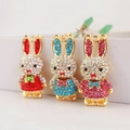 Set of three cute cartoon long-eared rabbit keychains with rhinestones and gold alloy base - Random Color