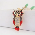 Sparkling owl keychain with colorful rhinestones and gold-plated alloy finish - Red