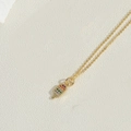 Close-up of gold lollipop pendant with rainbow cubic zirconia and fine gold chain - Ice Cream Style / Gold