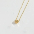 Collana minimalista in oro con pendente a cilindro, motivo a croce e intarsio zircone - Cavo (Oro)