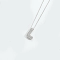 Silver gothic letter L pendant necklace with shimmering pave crystals on a delicate chain - Letter L