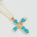Golden cross necklace featuring four blue heart zircons and a central Virgin Mary relief - Lake Blue (XL3175)