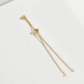 Detalle de cadena ajustable dorada con eslabones venecianos y bola deslizante para joyería - Dorado