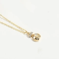 Exquisite gold clavicle necklace featuring a lucky bag pendant with white inlay and crystals - Pumpkin Carriage