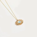 Collier œil porte-bonheur doré serti de zircons colorés sur fond minimaliste blanc cassé - Cils XL3305-5MA1-4