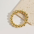 Luxe gouden gladde kralenarmband met gepolijste metalen textuur en spiegelende glans - Ca. 1.1cm Kraaldiameter / Goud
