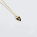 Minimalist gold necklace featuring a black heart enamel pendant with center cutout - Gold Necklace Black Heart Pendant / Black Heart