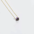 Golden necklace featuring a Halloween pendant with a purple hat character - Brownish Black Pumpkin