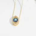 Exotic golden devil's eye pendant necklace with blue enamel and crystal inlay - Dark Blue