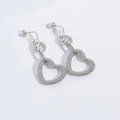Silver-toned long heart drop earrings with shimmering micro-pave cubic zirconia stones - Hollow Heart (Silver)