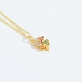 Golden clover pendant necklace with multicolor cubic zirconia stones on thin cross chain - Four-Leaf Clover