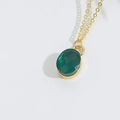 Elegante goldene Halskette mit facettiertem ovalem grünem Zirkon Anhänger für Damen - Grün