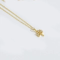 Elegant gold tree of life necklace featuring sparkling zircon crystals on a fine link chain - Jenny J. Tree