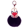 Detail of rose gold fox head keychain with rhinestones and deep purple faux fur pompom - Red Fox Head + Black Fur Ball