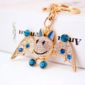 Cute golden crystal bat keychain with sparkling blue rhinestones for car keys and bags - Blue
