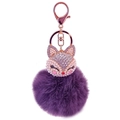 Close-up of sparkling rhinestone fox head and purple faux fur pompom keychain detail - White Fox Head + Purple Fur Ball