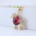 Elegante portachiavi a forma di barboncino dorato con grande cristallo rosso rosa e strass - Viola