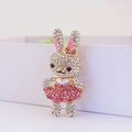Portachiavi a forma di coniglio con strass bianchi e rosa e fiocco in finitura oro - 11.9x3.1cm / Rosa