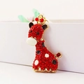 Gouden giraffe sleutelhanger met rode strass steentjes en witte stippen - Individuele Verpakking / Rood