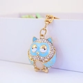 Blue enamel owl keychain with white rhinestones and gold alloy clip for handbags - Blue