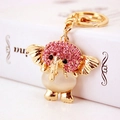 Portachiavi elefante con strass rosa e opale bianco su catena metallica dorata - Rosa