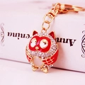 Cute red owl keychain with golden trim, rhinestones and a white opal stone - Red