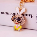 Cute cartoon rabbit keychain with sparkling rhinestones and yellow outfit in gold finish - Individual Packaging / Yellow