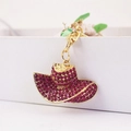 Portachiavi a forma di cappello con strass rosa fucsia e chiusura dorata per donna - Viola
