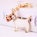 Llavero de perro terrier dorado con cristales brillantes e incrustaciones de nácar blanco - Blanco