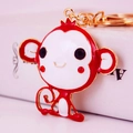 Creative cartoon monkey keychain with red and white enamel and sparkling rhinestones - Red