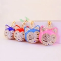 Creative cute fox head rhinestone keychains in purple, red, blue, and pink colors - Weight 59.3g Length 10.1*4.4CM / Random Color