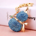 Llavero Wu Lou con diamantes de imitación azules y lazo dorado, accesorio para bolsos - Azul